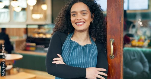 Entrance, arms crossed and restaurant woman, happy cafe waitress or boss smile for small business, bakery or coffee shop. Open diner, portrait and confident entrepreneur leaning on storefront door photo