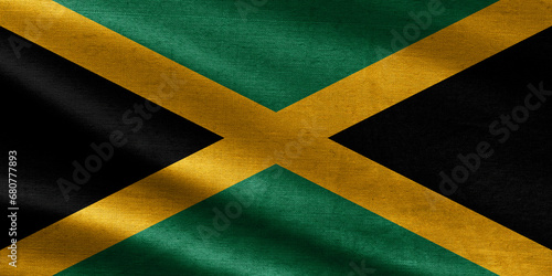 Close up waving flag of Jamaica. flag symbols of Jamaica. Jamaica flag pattern on the fabric texture ,vintage style photo