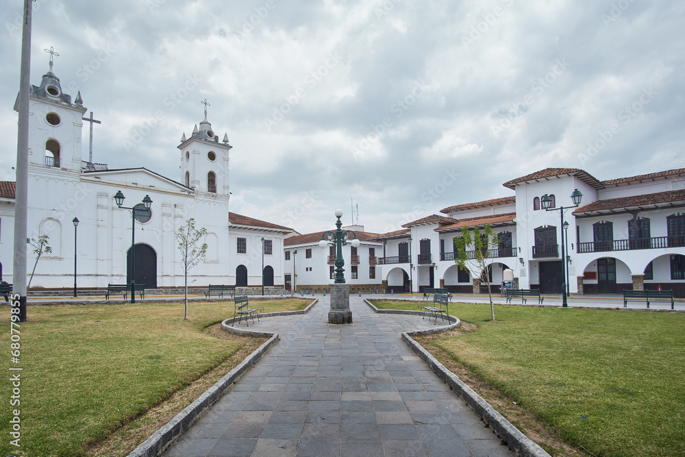 Fototapeta premium Chachapoyas Main Square, characterized by white buildings. On the left, you can see the cathedral, and on the right, the municipal building.