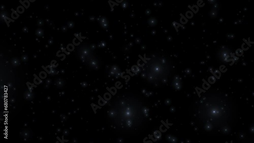 Abstract loop animation falling flickering blue particles stars bokeh animation on black background. Holiday concept backdrop. De-focused light bokeh particles ember on black background  photo