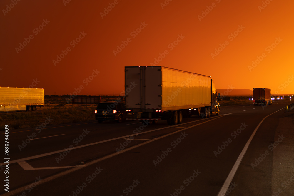 truck on highway at sunset