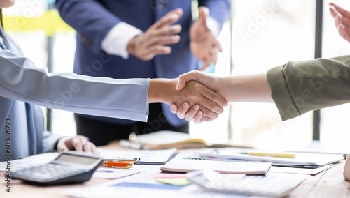 Business Team offer and give hand for handshake in office. Successful job interview. Apply for loan in bank. Salesman, bank worker or lawyer shake for deal, agreement or sale. Increase of salary. 