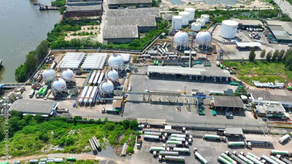 Captured from above, a natural gas terminal comes alive, a symphony of steel and machinery, connecting energy sources to homes and industries. Aerial view drone.
Captured from above, a natural gas terminal comes alive, a symphony of steel and machinery, connecting energy sources to homes and industries. Aerial view drone.