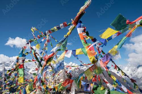Prayer flags pole on the top of Tsergo Ri (4,990m) the high point on the Langtang valley trek of Nepal.