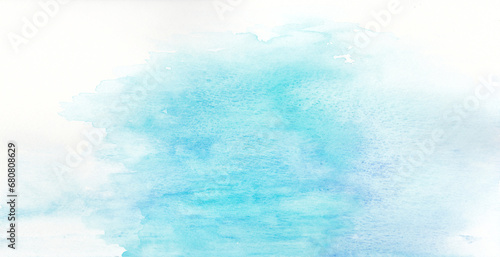コピースペースのある冬をイメージした水色の水彩背景　背景イラスト　テクスチャ素材	