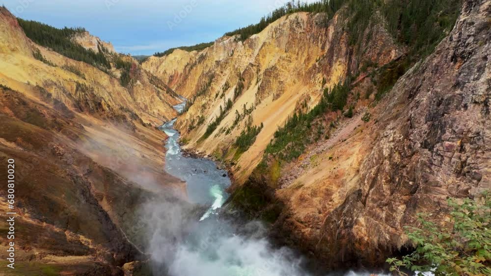 Upper lower Falls Waterfalls Grand Canyon of the Yellowstone National Park river HDR lookout artist point autumn Canyon Village lodge roadway stunning daytime landscape view cinematic pan right slowly Upper lower Falls Waterfalls Grand Canyon of the Yellowstone National Park river HDR lookout artist point autumn Canyon Village lodge roadway stunning daytime landscape view cinematic pan right slowly