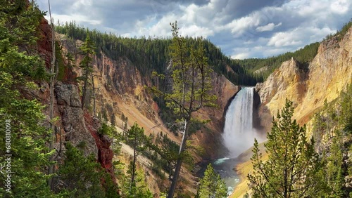 Grand Canyon of the Yellowstone National Park river Upper lower Falls waterfall HDR lookout artist point autumn Canyon Village lodge roadway stunning daytime landscape view cinematic pan right slowly photo