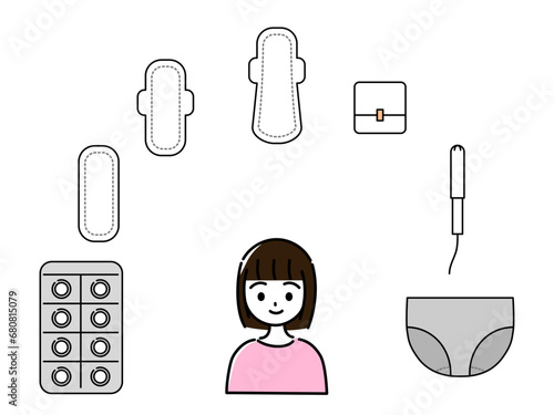 中学生くらいの笑顔の女の子と生理用品