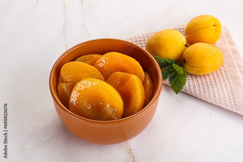 Few canned aprocots in the bowl Few canned aprocots in the bowl