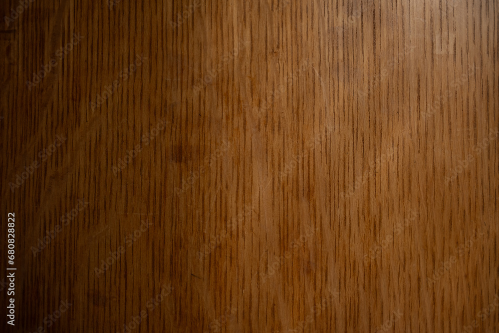 Naklejka premium The deep, rich texture of the wood paneling in a Victorian mansion.