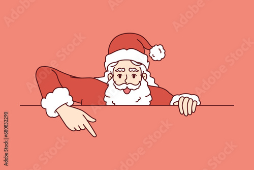 Christmas santa claus points finger at blank banner inviting to celebrate new year holidays together. Christmas offer from santa announcing start of sale with favorable prices on gifts