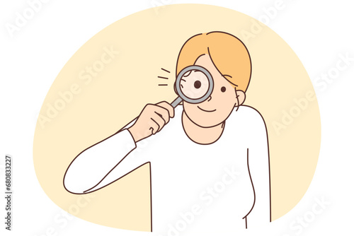 Motivated woman with magnifier search for options
