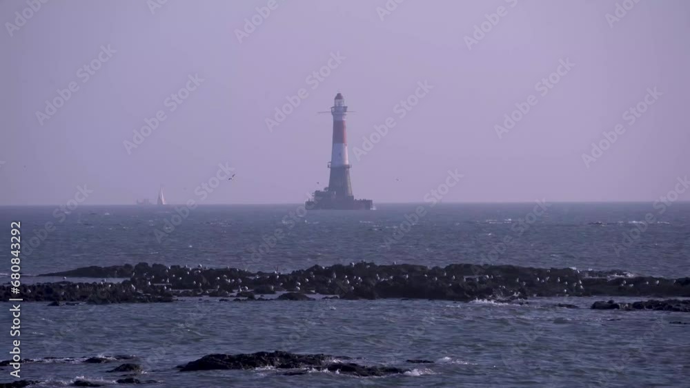 Lighthouse on the sea wide view Lighthouse on the sea wide view