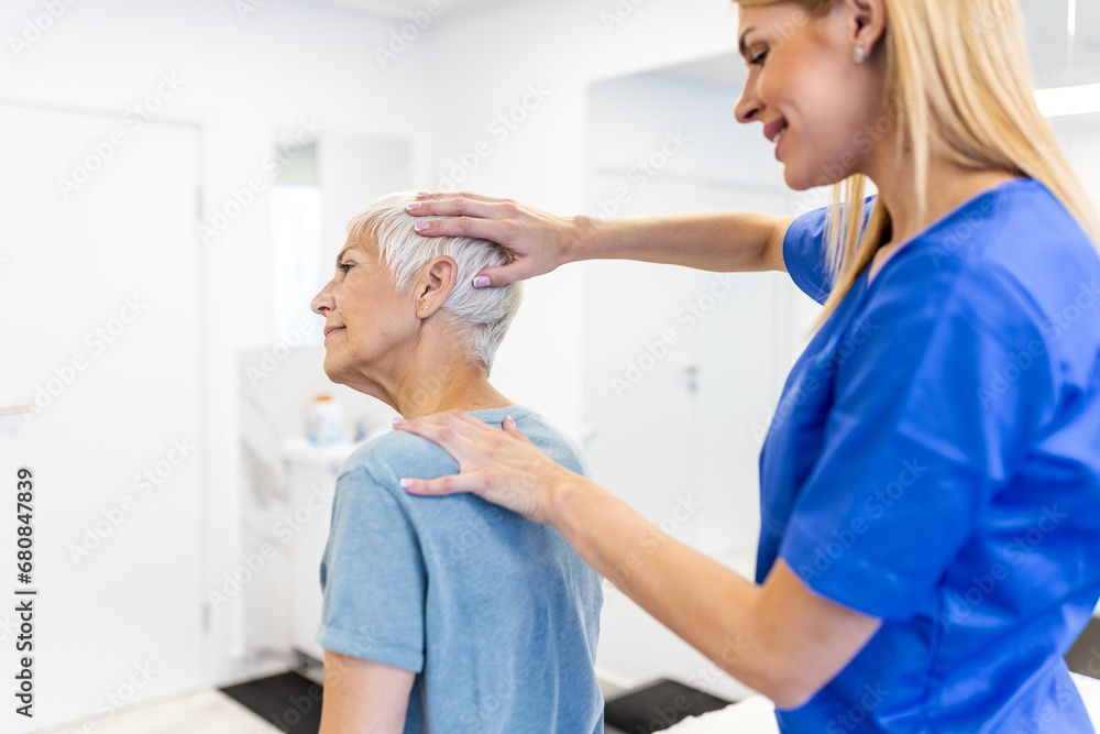 Licensed chiropractor or manual therapist doing neck stretch massage to relaxed female patient in clinic office. Young woman with whiplash or rheumatological problem getting professional doctor's help Licensed chiropractor or manual therapist doing neck stretch massage to relaxed female patient in clinic office. Young woman with whiplash or rheumatological problem getting professional doctor's help