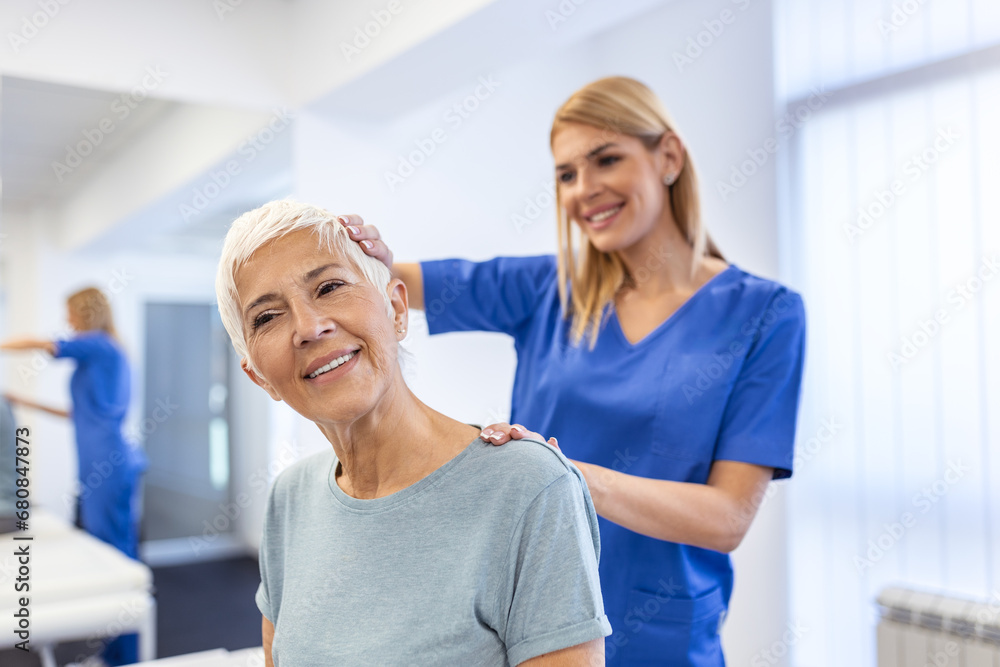 Obraz premium Licensed chiropractor or manual therapist doing neck stretch massage to relaxed female patient in clinic office. Young woman with whiplash or rheumatological problem getting professional doctor's help