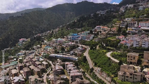 Aerial view of mountainous town New Tehri settled at the bank of Bhagirathi River in Uttarakhand. New Tehri town, near the holy city of Rishikesh the Biggest resettlement in India. photo