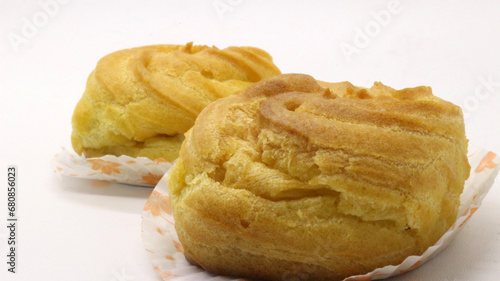 Two traditional cake Cream puffs