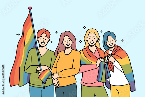 LGBT people with rainbow flags for gay parade are called to celebrate pride month and take part in queer festival. LGBT and LGBTq men and women promote free love or non-traditional values