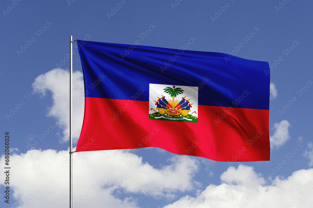Haiti flag fluttering in the wind on sky. Haiti flag fluttering in the wind on sky.