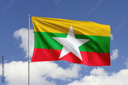 Myanmar flag fluttering in the wind on sky.