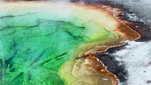 Morning Glory Opal Pool Grand Prismatic Spring West Yellowstone National Park Old Faithful Grand loop geysers scenic Wyoming Idaho mist steam thermal colorful yellow morning cinematic slowly pan left photo