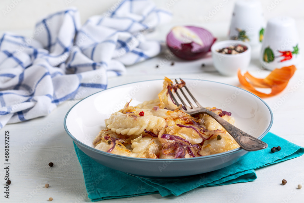 Homemade vareniki (dumpling) with cabbage. Homemade vareniki (dumpling) with cabbage.