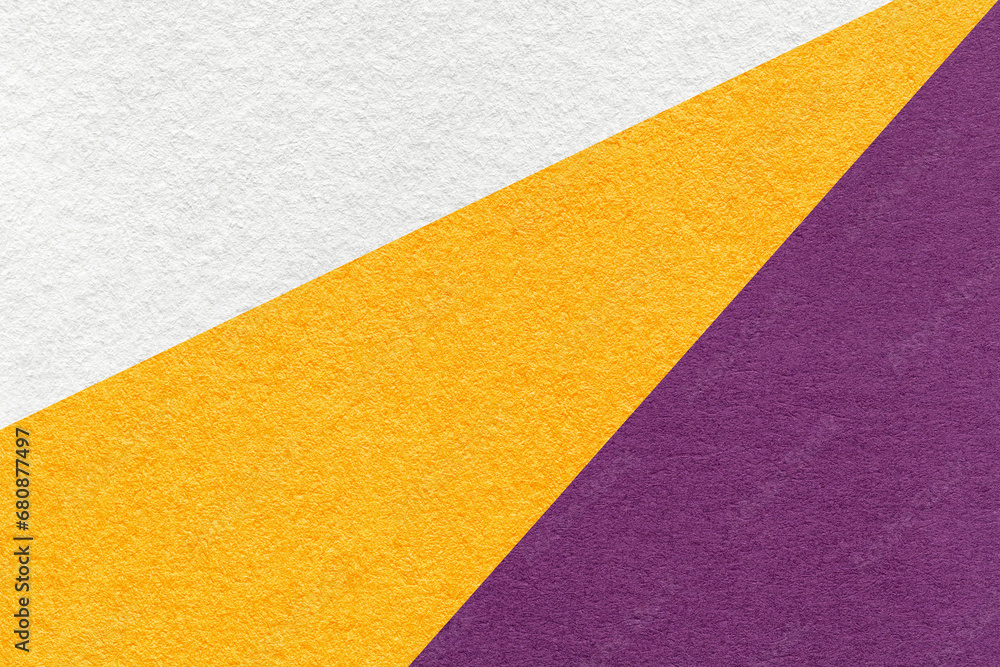 Texture of old craft white, yellow and purple color paper background, macro. Vintage abstract violet cardboard Texture of old craft white, yellow and purple color paper background, macro. Vintage abstract violet cardboard
