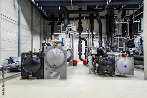 Machines and pipework in a factory for energy distribution photo