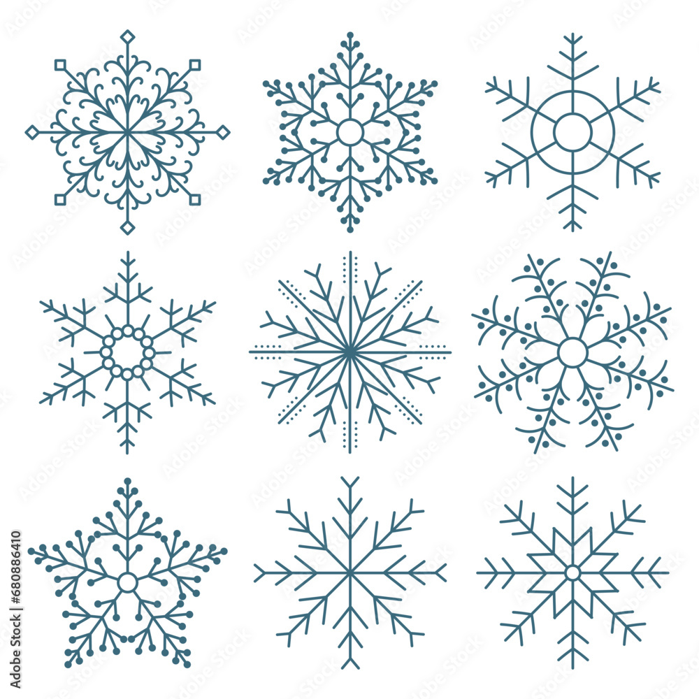 Fototapeta premium Set of hand drawn lacy blue snowflakes on a white background. Winter design elements, vector