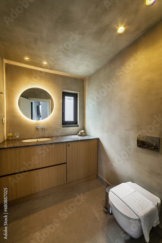 Canvas Print Modern bathroom interior design featuring brown and yellow color walls, a white
