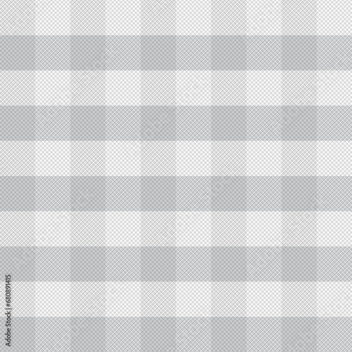 Grey and white buffalo plaid seamless pattern fabric texture with herringbone background.
