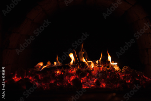 Fire in the oven. Oven with burning fire. Close-up, Background