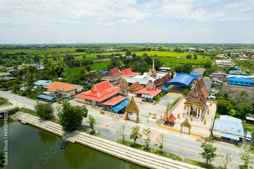 Aerial city view from flying drone at Wat Prem Prachakon ,Chiang Rak Noi, Bang Pa-in District, Phra Nakhon Si Ayutthaya,Thailand photo