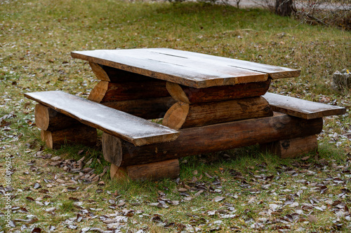 robust benches and table in Nature reserve Hallkistan Kumla Sweden photo