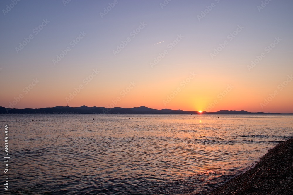 A beautiful and colorful sunset at the coast at Zadar, Croatia A beautiful and colorful sunset at the coast at Zadar, Croatia