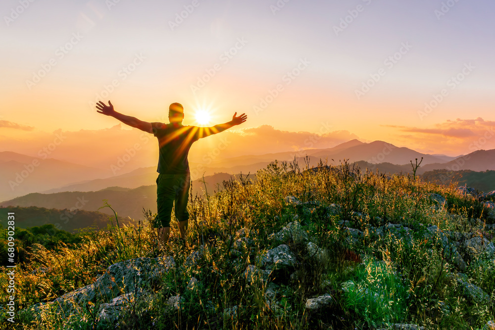 man doing hiking sport in mountains with anazing highland view - obrazy, fototapety, plakaty 