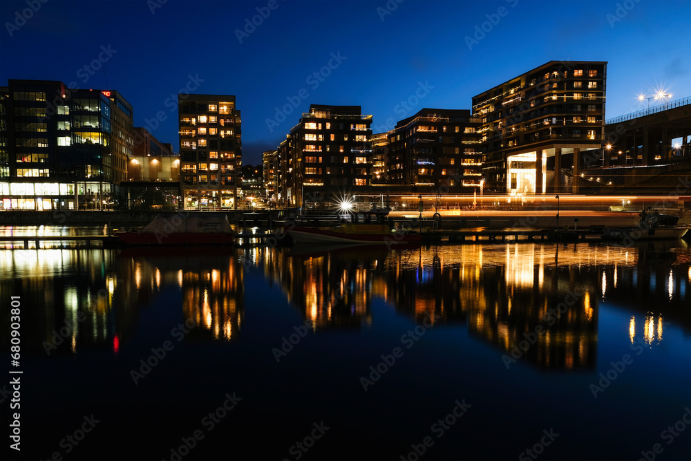 Illuminated buildings by marina in Stockholm, Sweden Illuminated buildings by marina in Stockholm, Sweden