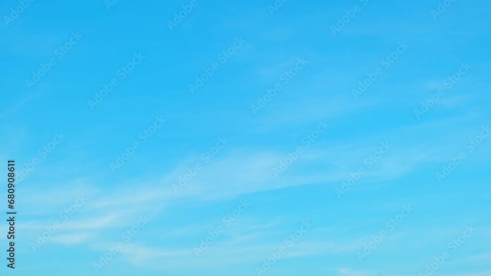 Blue sky time-lapse, the sky transforms from a clear azure to a canvas of cumulus chaos. Clouds rush past, creating an ever-changing masterpiece against the vibrant blue backdrop. Timelapse. 4K.
Blue sky time-lapse, the sky transforms from a clear azure to a canvas of cumulus chaos. Clouds rush past, creating an ever-changing masterpiece against the vibrant blue backdrop. Timelapse. 4K.