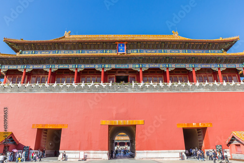 People entering the Meridian Gate in the Forbidden City in Beijing, China photo