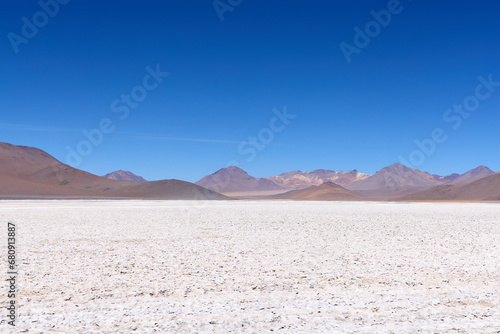 Bolivia  Avaroa National Park. Desert and mountain range on the horizon.