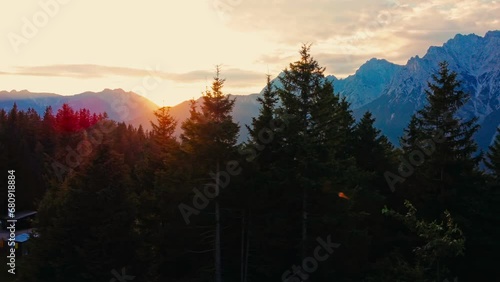 Austrian Mountains at Sunrise: Stunning Lake, Lush Forest, and Hiking Paths Bathed in Golden Morning Light
