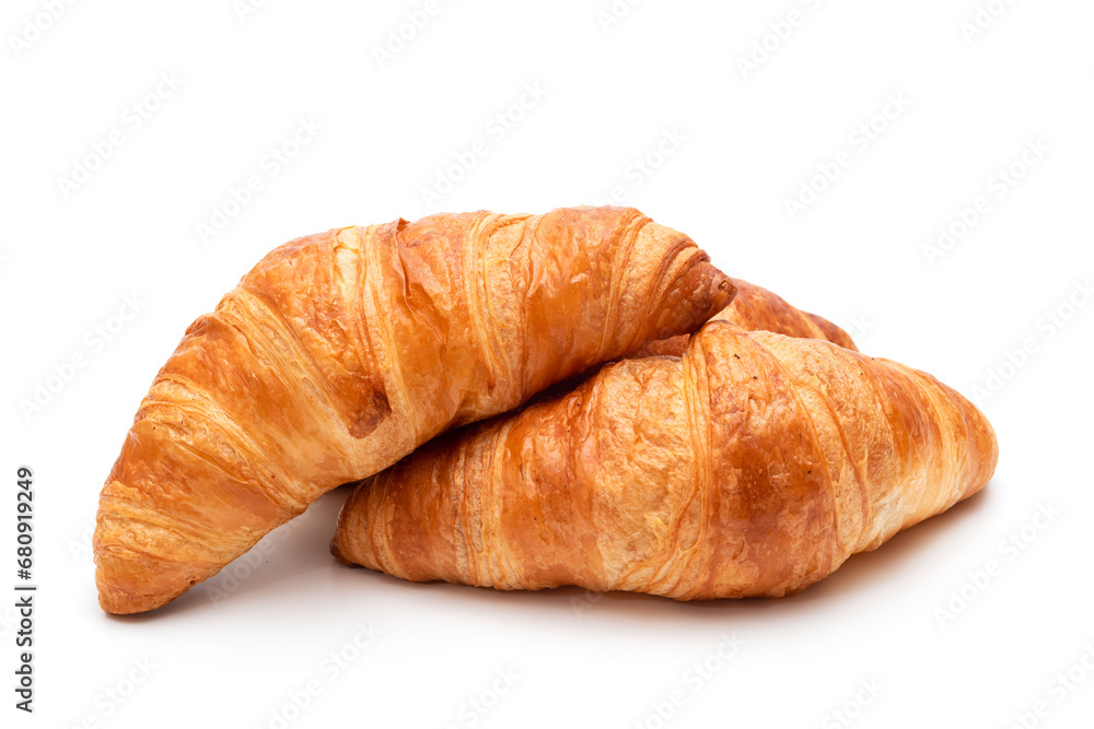 Crispy croissants on a white background close-up. French pastries