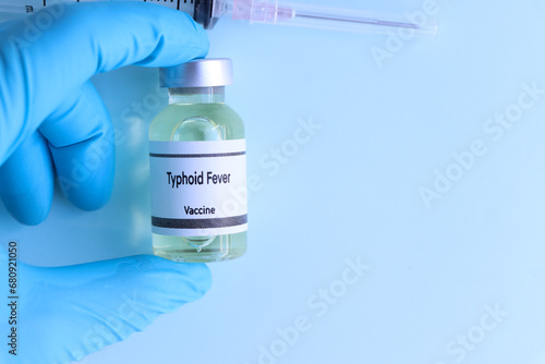 Photos Typhoid Fever vaccine in a vial, immunization and treatment of infection