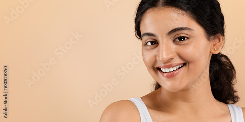 Skincare Concept. Closeup Shot Of Young Indian Woman With Beautiful Smooth Skin photo