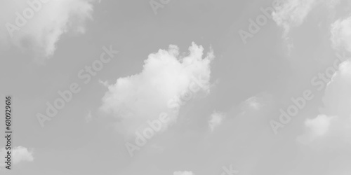 White cloud in the sky. View on a soft white fluffy cloud as background.  Cloudy sky, white clouds, black background pattern. The gray cloud trendy photo. White sky image 