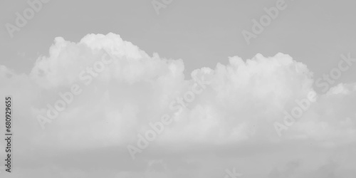 White cloud in the sky. View on a soft white fluffy cloud as background.  Cloudy sky, white clouds, black background pattern. The gray cloud trendy photo. White sky image 