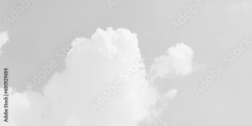 White cloud in the sky. View on a soft white fluffy cloud as background.  Cloudy sky, white clouds, black background pattern. The gray cloud trendy photo. White sky image 