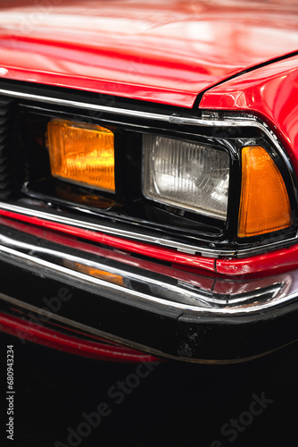 Close-up photo of car headlights © Dmitri Krasovski