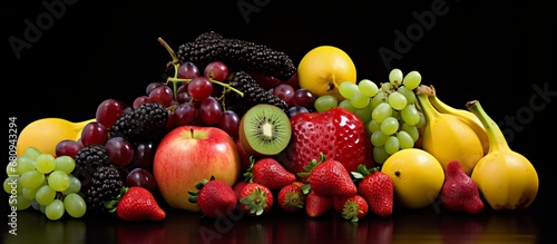 A Colorful Bounty of Fresh Fruits on a Wooden Table