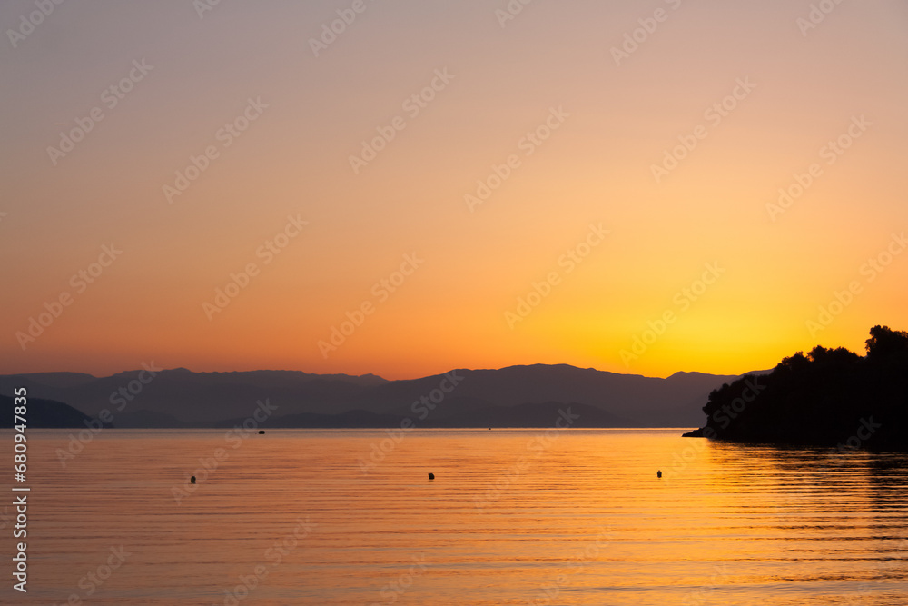 Corfu sunrise with hills on background